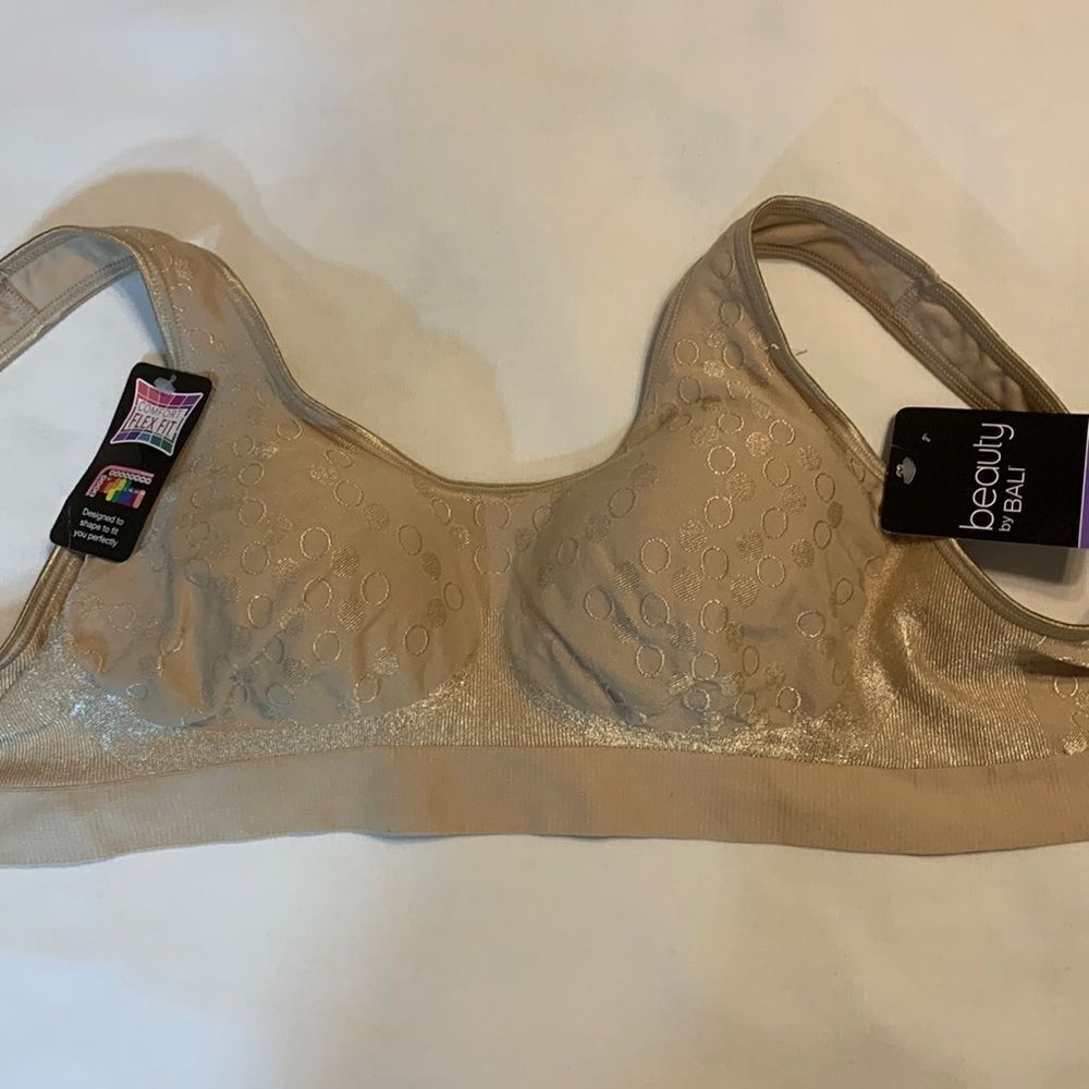 Bali Size Small comfort flex fit nude bra.  Lightly padded cups sewn in.  NWT